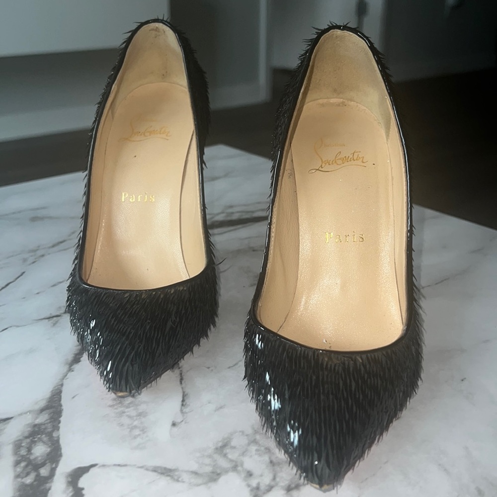 Black Louboutins
